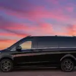 Taxi Biest-Houtakker – Luxe Mercedes V-Class bij zonsondergang